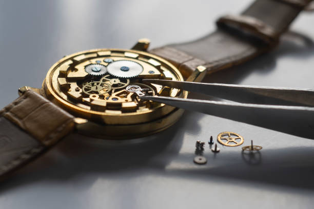Watchmaker repair mechanical watches. Gears repair. Watch repair process
